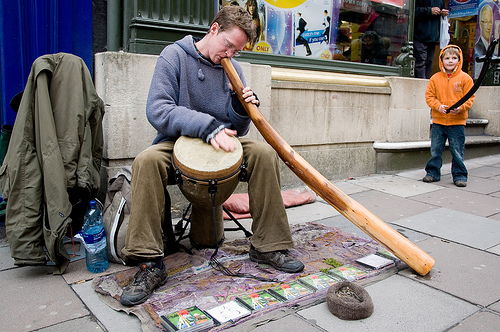 man playing didgeridoo
