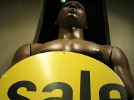 Male dummy with sale sign