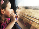 Child on fun and affordable train trip
