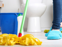 Woman using mop to clean
