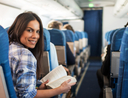 Woman making her next flight more comfortable