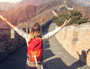 Choosing travel destinations that are cheaper due to strong U.S. dollar