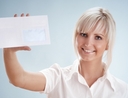 Woman holding an envelope