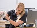 Woman looking through paperwork