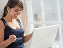 woman excited laptop
