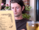 man reading menu