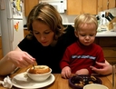 Mother and son eating