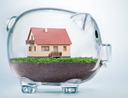 Saving to buy a house or home savings concept