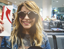 Woman at the airport waiting for her flight