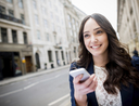 Woman learning how to snag free rides on uber, lyft, and sidecar