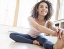 Woman using cheap home workout hacks