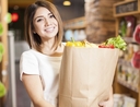 Woman learning tips to save big at the grocery store