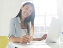 Woman mastering personal finance skill before all others