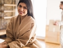 Woman learning how to choose an income rental property