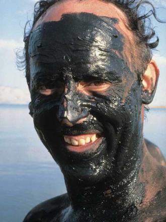man with mud face